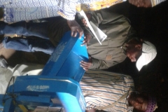 Fundong-deputy-mayor-Baiso-chief-and-a-traditional-council-recieve-corn-mill-from-sekakoh